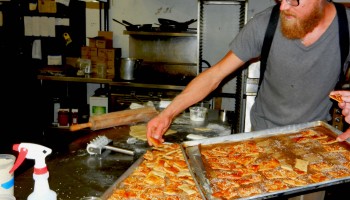 man with catering trays